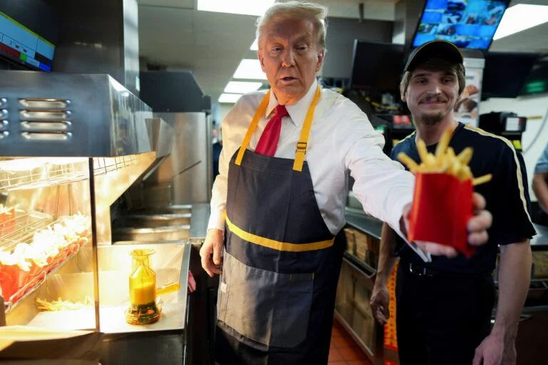 Former President Donald Trump serves customers during his visit to McDonald's in Feasterville-Trevose, Pennsylvania.